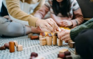 Child and parents playing with toys